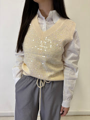 Gilet in paillettes con camicia abbinata